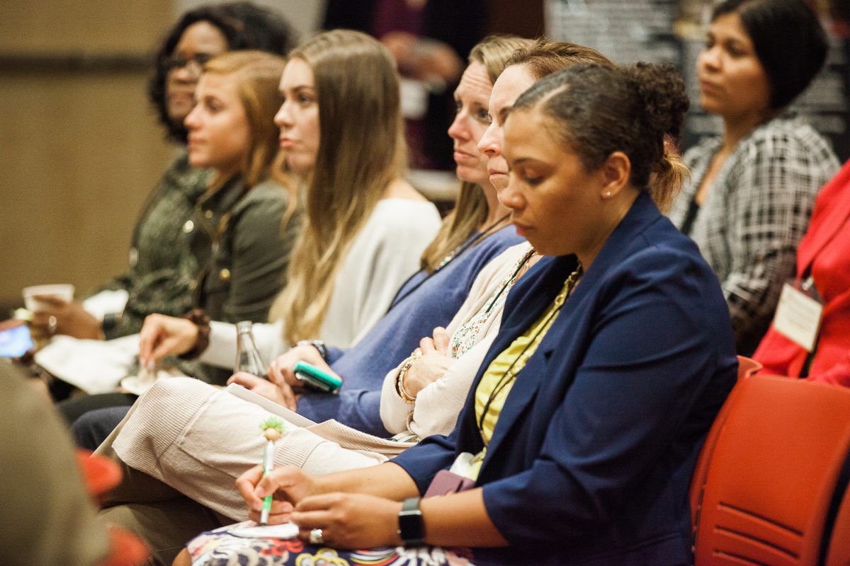 Encore Conference participants listening to pitches