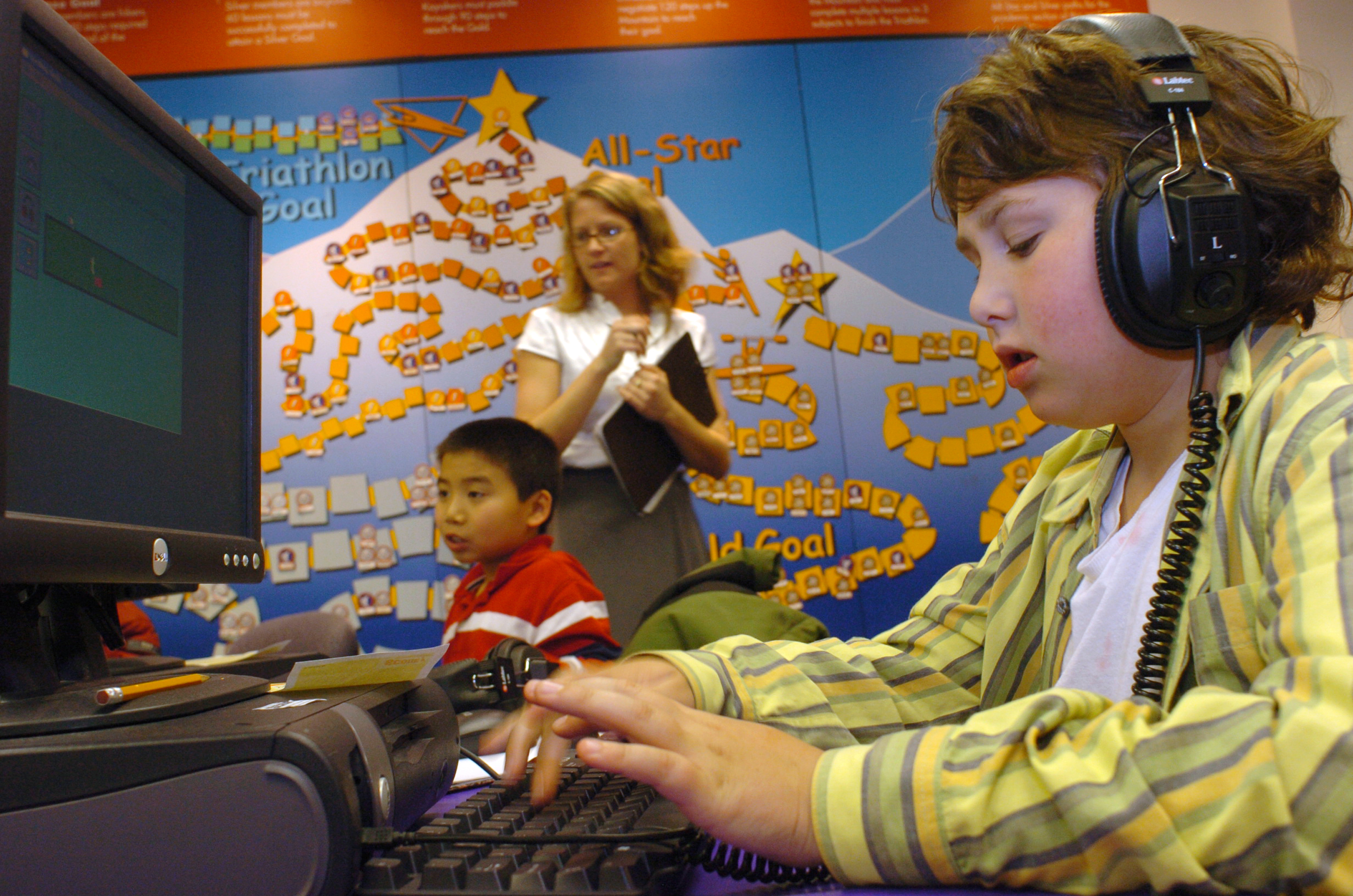Fifth grader working at the computer during his after-school learning