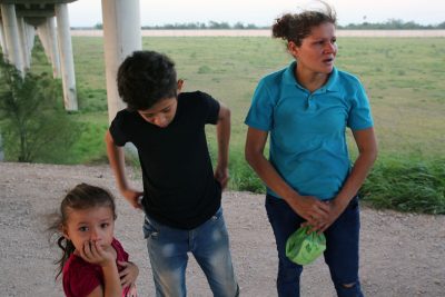 young Honduran woman and her two children