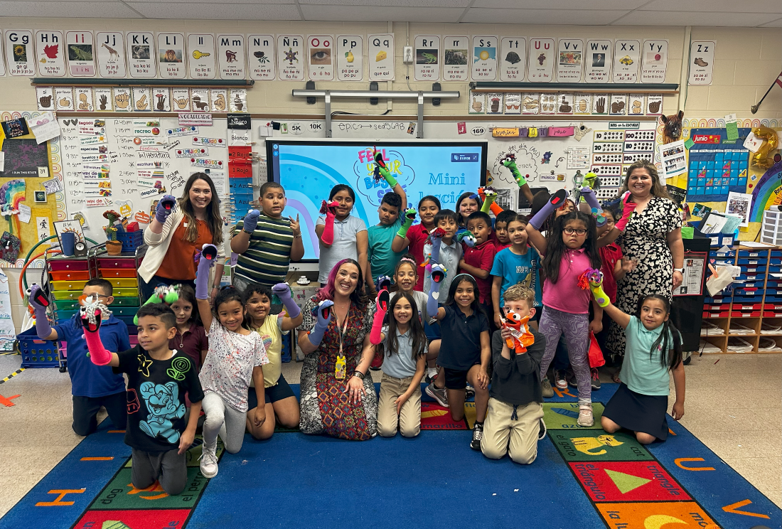Staff from Feel Your Best Self visit an elementary school classroom