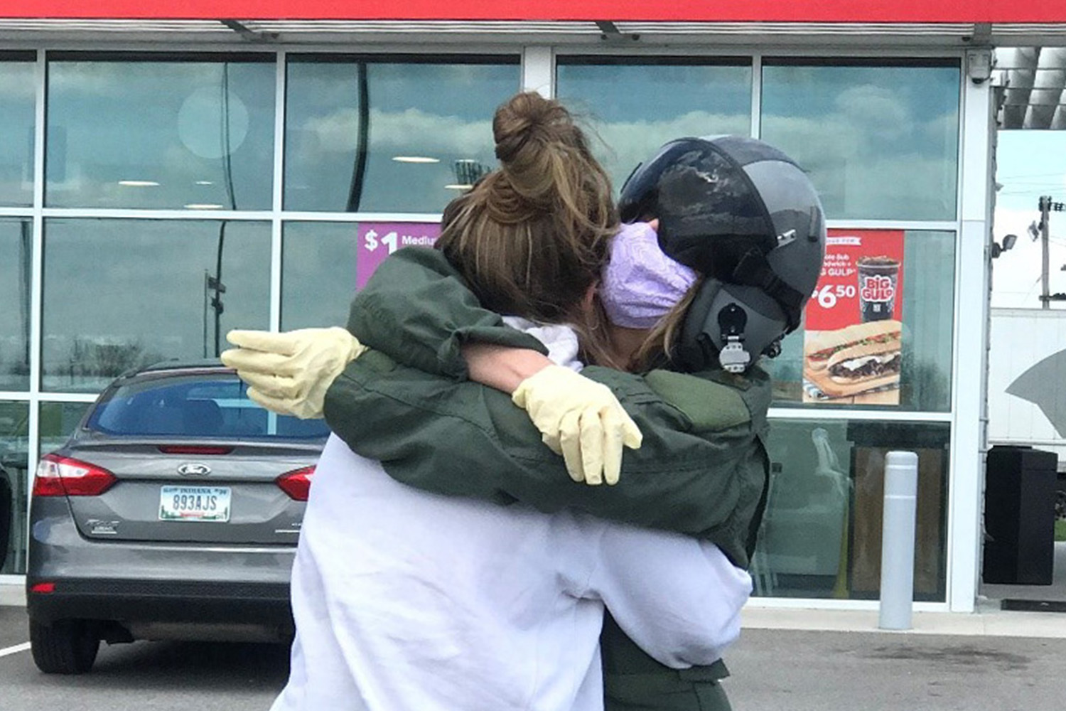 A mother hugging her daughter who had been working as an ICU nurse with strictly COVID prone vented patients for 4–6 weeks straight. (Pandemic Journaling Project) 