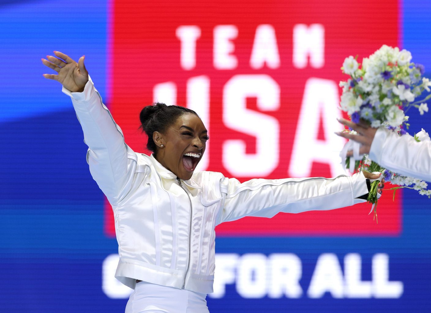 Simone Biles celebrates after being selected for the 2024 U.S. Olympic Women's Gymnastics Team (Elsa/Getty Images)