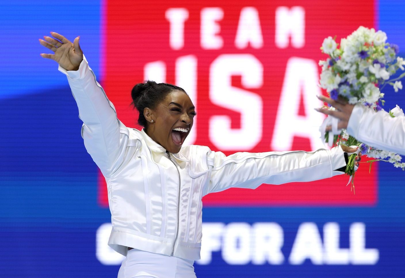 Simone Biles celebrates after being selected for the 2024 U.S. Olympic Women's Gymnastics Team (Elsa/Getty Images)