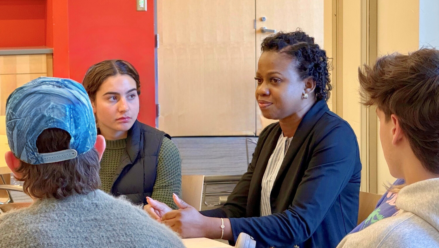 Christina Ross talks with students