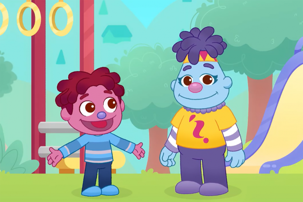 A screenshot from the FYBS animated short, Feel the Roses: Niko stands next to some rings on a playground smiling with hands out to his sides. He stands next to CJ, who has a smile on their face.